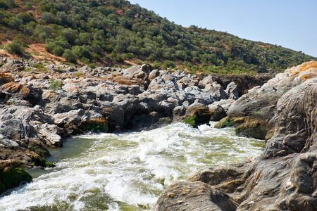 Pulo do Lobo or wolf's leap waterfall and cascade on river Guadiana in vicinity of Mertola, Alentejo, Portugalの写真素材