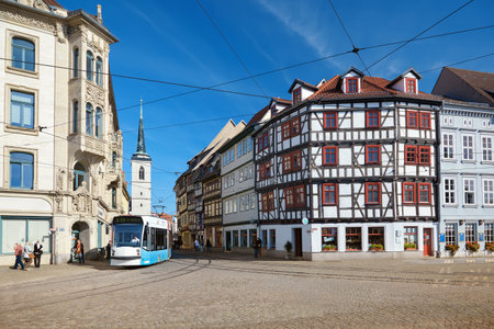 ERFURT, GERMANY - OCTOBER 4, 2010: Historical half-timbered and stone houses on a market square in Erfurt,Thuringia, Germanyのeditorial素材