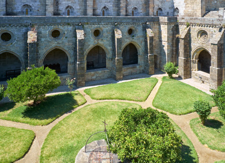 The view of the cloister and the interior courtyard of Cathedral (Se) of Evora. Portugalのeditorial素材