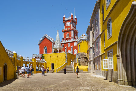 SINTRA, PORTUGAL - JULY 03, 2016: The view of arches terrace with Clock tower and chapel dedicated...