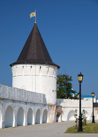 The view of the South Round tower with 11-sided stone tent dome at the south fortress wall of the Tobolsk Kremlin. Tobolsk. Russiaのeditorial素材
