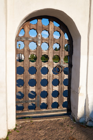 The wooden fenestrated door in the wall of Tobolsk Kremlin. Tobolsk. Tyumen Oblast. Russiaのeditorial素材