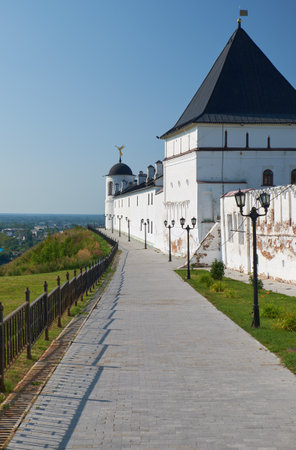 The view of the eastern wall of Tobolsk Kremlin with the Eastern square tower, South-eastern round tower and pontifical stables. Tobolsk. Siberia. Russiaのeditorial素材