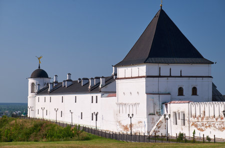 The view of the eastern wall of Tobolsk Kremlin with the Eastern square tower, South-eastern round tower and pontifical stables. Tobolsk. Siberia. Russiaのeditorial素材