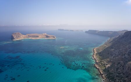 Aerial view from drone on Platiskinos mountain range and Gramvoussa islands near Balos lagoon. Dimos Kissamou, Chania prefecture, Crete, Greece.の写真素材