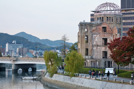 HIROSHIMA, JAPAN â NOVEMBER 23, 2007: The view of the Atomic Bomb Dome - skeletal ruins of the former Hiroshima Prefectural Industrial Promotion Hall on the rivershore of Ota river. Hiroshima. Japanのeditorial素材