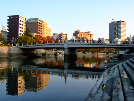 The modern reconstructed Aioi Bridge,  the aiming point for the Atomic bombing of Hiroshima, at sunset light. Hiroshima Peace Memorial Park. Hiroshima. Japanのeditorial素材