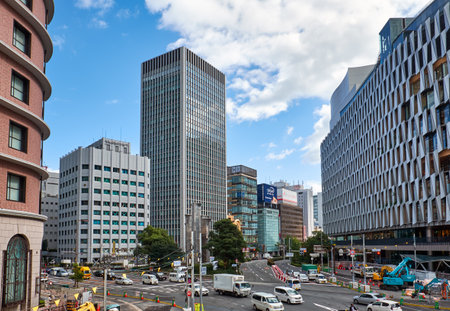 OSAKA, JAPAN - OCTOBER 15, 2019:  The modern high-rise buildings and road junctions in the urban center surrounding the Osaka station, the New Umeda City. Japanのeditorial素材