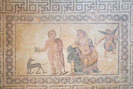 PAPHOS, CYPRUS - JUNE 08, 2018: Floor mosaic depicting the hunting Hippolytos, Phaedra sitting on the trone and cupid directing to her heart. Villa Dionysos. Paphos Archaeological Park. Cyprusのeditorial素材
