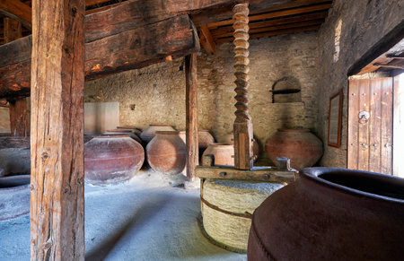 LANEIA, CYPRUS - JUNE 09, 2018: Commandaria storage open museum in the grape cultivation village Lania with old wine press Lenos for production of dessert wine Commandaria. Limassol. Cyprusのeditorial素材