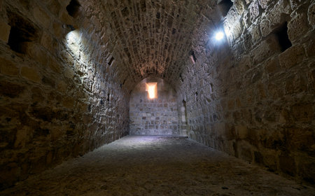 KOLOSSI, CYPRUS - JUNE 12, 2018: The storage room with the underground water cisterns on the ground floor of Kolossi Castle. Kolossi. Limassol District. Cyprusのeditorial素材