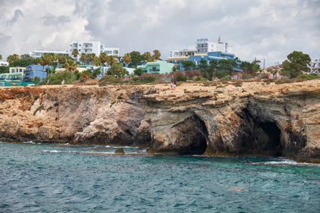 AYIA NAPA, CYPRUS - JUNE 18, 2018: The view of elevated coastal plateau of Cape Greco with the Ayia Napa city on the background. Cyprusのeditorial素材