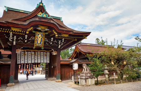 KYOTO, JAPAN - OCTOBER 17, 2019:  The view of the traditional Chinese (karamon or karakado) type gate, the Sanko-mon Gate at Kitano Tenmangu shrine. Kyoto. Japanのeditorial素材