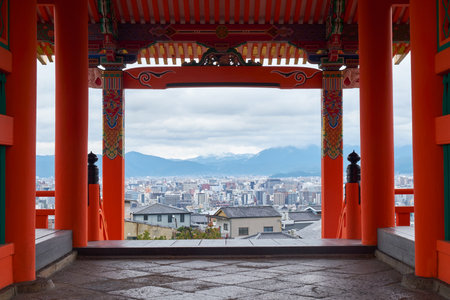 West (Sei-mon) gate clearance of Kiyomizu-dera temple with the spectacular view of the surrounding mountains and old town. It has been considered a gateway to Paradise and a sacred place. Kyoto. Japanのeditorial素材