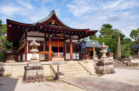 The view of the Haiden of Shikichi-jinja Shrine (Wara-tenjin) with the two stone lantern in front of it. Kyoto. Japanのeditorial素材