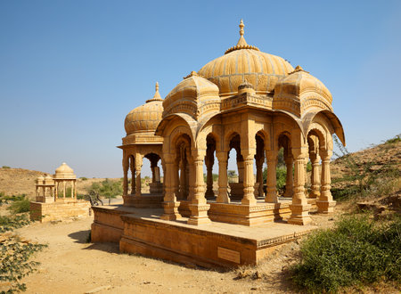 Jaisalmer, India - November, 29, 2012: Photo of Chartis, Hindu tomb mausoleum or Bada Bagh cenotaphs in Rajastan. Indo-islamic architecture style. Jaisalmer, India.のeditorial素材