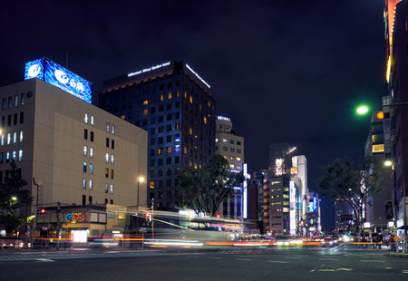 Tokyo, Japan - October 24, 2019: The view of one of the main shopping street of Ginza district, the Harumi dori avenue at the bright night lighting. Tokyo. Japanのeditorial素材