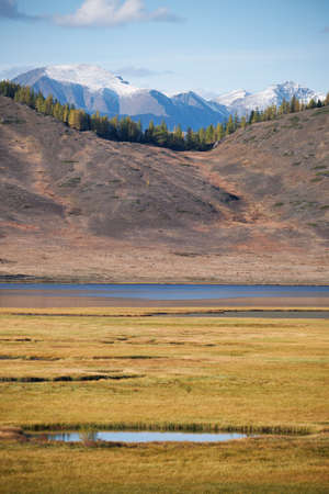 View on Altai lake Dzhangyskol and mountain plateau Eshtykel. North Chui ridge. Altai, Siberia,...