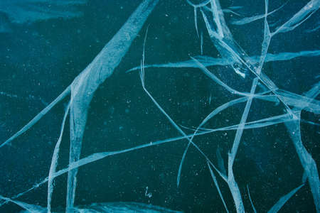 Texture of winter ice surface. Blue natural ice background.