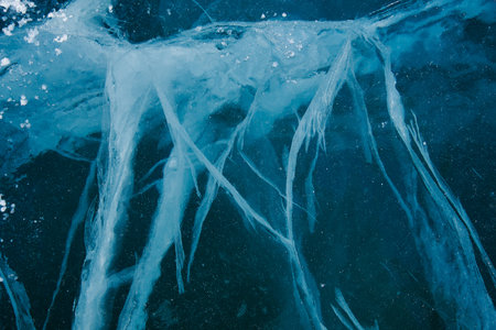 Texture of winter ice surface. Blue natural ice background.の写真素材