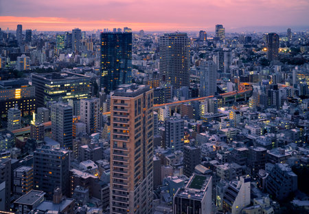 Tokyo, Japan - October 23, 2019: The skyscrapers of ARK Hills as seen from the Tokyo Tower observation deck at evening. Minato city. Tokyo. Japanのeditorial素材