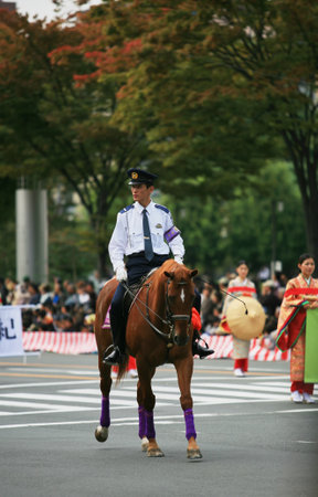 Kyoto, Japan - October 22, 2007: The view of the mounted police keep order at the autumn Jidai Festival. Kyoto. Japanのeditorial素材