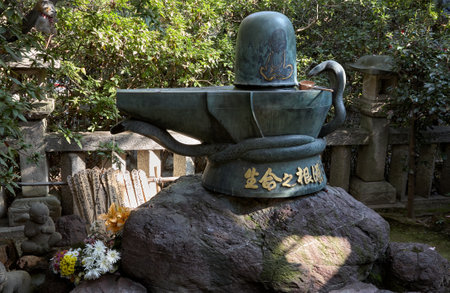 Nagoya, Japan - November 20, 2007: The bronze Shiva Linga in Toganji temple. The symbol of lingam-yoni, the union of the feminine and the masculine in Buddhist mythology. Nagoya. Japanのeditorial素材