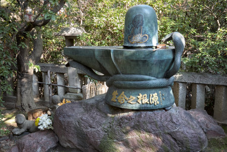 Nagoya, Japan - November 20, 2007: The bronze Shiva Linga in Toganji temple. The symbol of lingam-yoni, the union of the feminine and the masculine in Buddhist mythology. Nagoya. Japanのeditorial素材