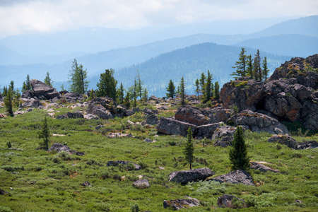 Stone cliffs on the mountainside. Seminsky mountain range in Altai, Siberia.の写真素材