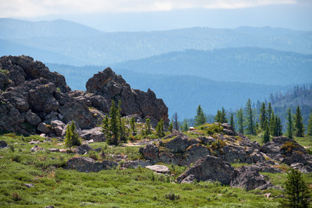 Stone cliffs on the mountainside. Seminsky mountain range in Altai, Siberia.の写真素材