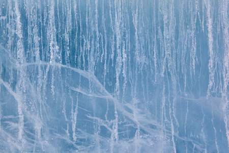 Texture of winter ice surface. Blue natural ice background.の写真素材
