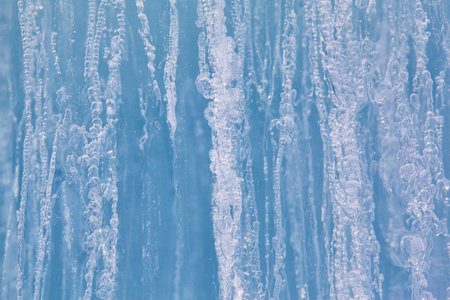 Texture of winter ice surface. Blue natural ice background.の写真素材