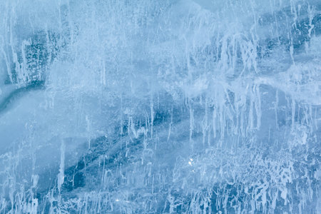Texture of winter ice surface. Blue natural ice background.の写真素材