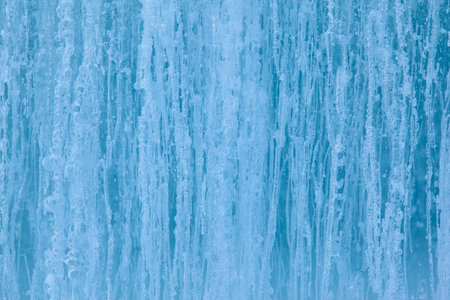 Texture of winter ice surface. Blue natural ice background.の写真素材