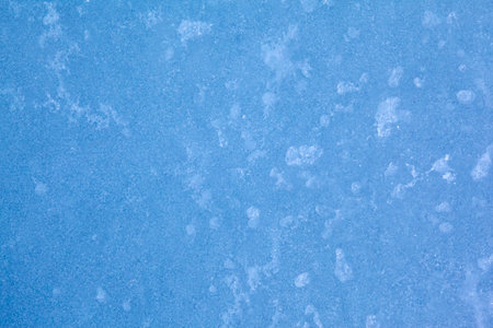Texture of winter ice surface. Blue natural ice background.の写真素材