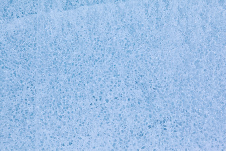 Texture of winter ice surface. Blue natural ice background.の写真素材