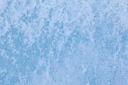 Texture of winter ice surface. Blue natural ice background.の写真素材
