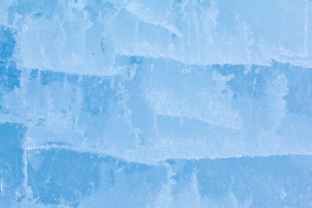 Texture of winter ice surface. Blue natural ice background.の写真素材