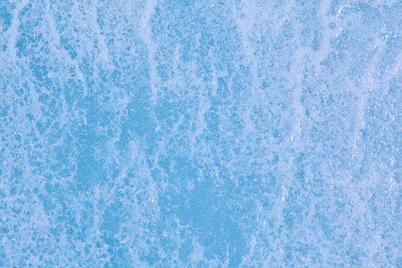 Texture of winter ice surface. Blue natural ice background.の写真素材