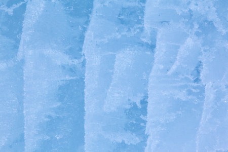 Texture of winter ice surface. Blue natural ice background.の写真素材
