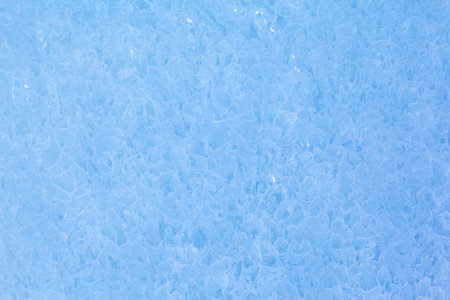 Texture of winter ice surface. Blue natural ice background.の写真素材