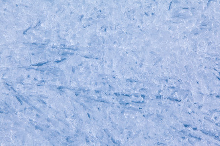 Texture of winter ice surface. Blue natural ice background.の写真素材