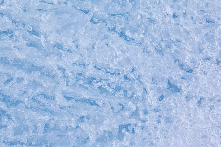 Texture of winter ice surface. Blue natural ice background.の写真素材