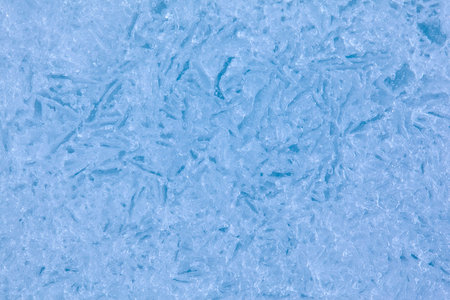 Texture of winter ice surface. Blue natural ice background.の写真素材