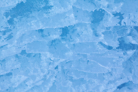 Texture of winter ice surface. Blue natural ice background.の写真素材