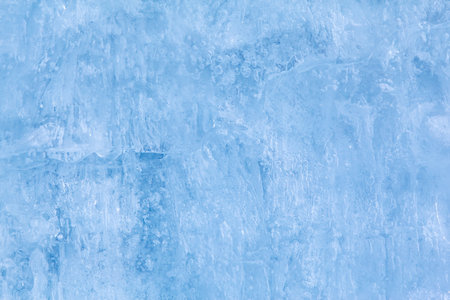 Texture of winter ice surface. Blue natural ice background.の写真素材