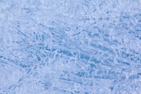 Texture of winter ice surface. Blue natural ice background.の写真素材