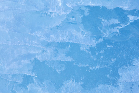 Texture of winter ice surface. Blue natural ice background.の写真素材