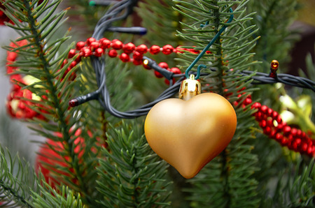 Golden heart. Christmas tree toy.の写真素材