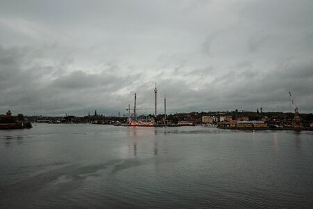 Sweden. Stockholm. Stockholm coast early in the morning. Lights of the morning city. September 17,...